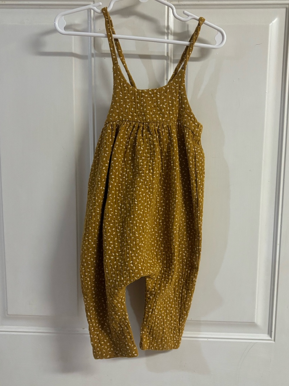 3/6M Rylee & Cru Seeds Mustard Yellow/White speckled sleeveless Gigi jumpsuit.